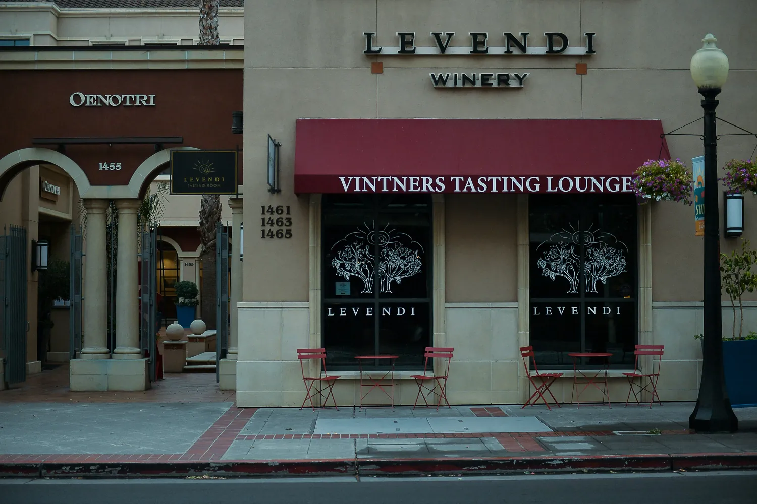 A tasting lounge front in Napa, with three separate street numbers listed on the one building.